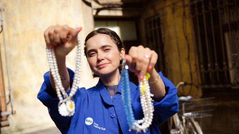 Woman displaying jewellery